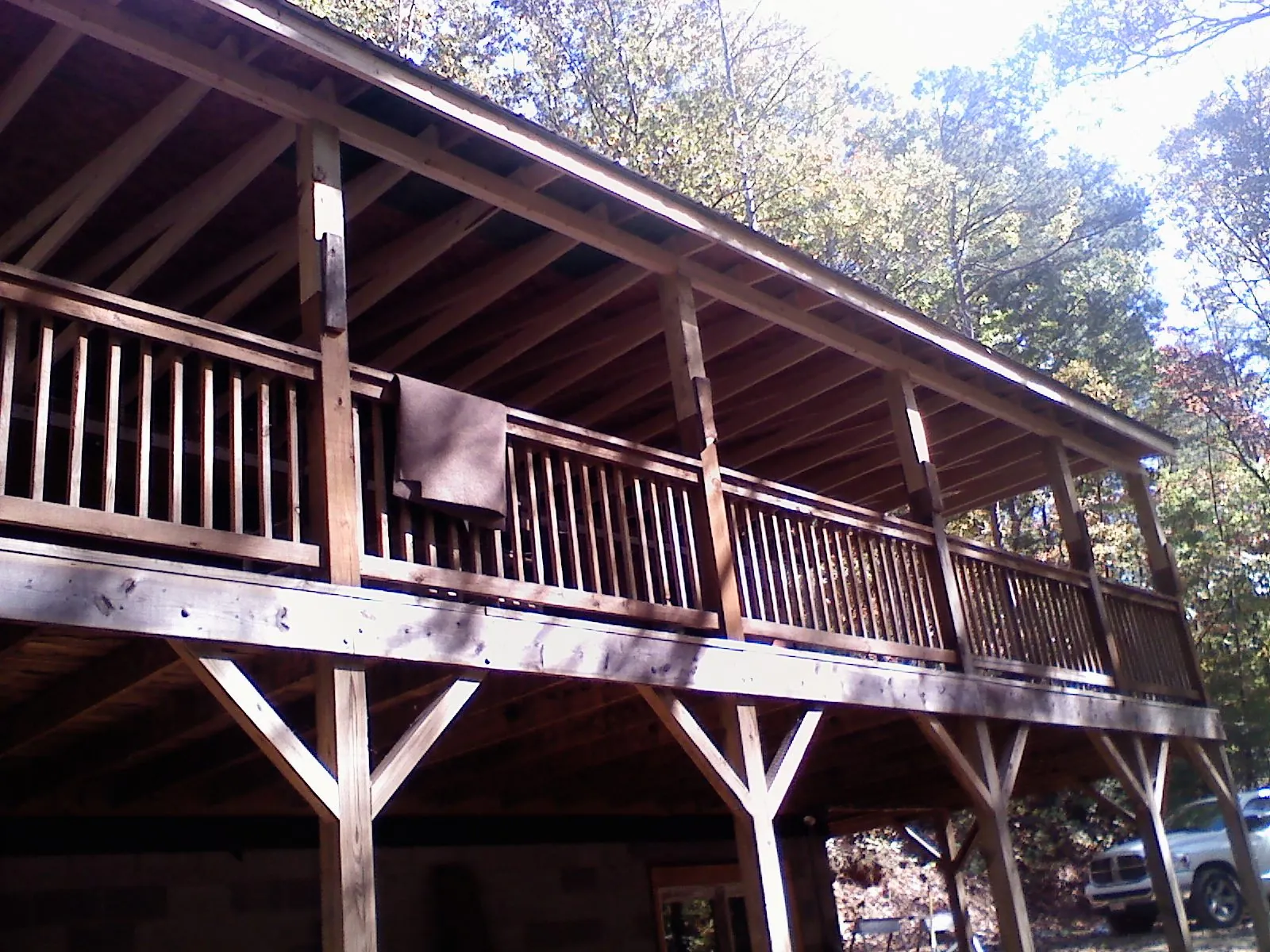 Timber framing under a new elevated porch and deck — Roof Leak Repair in Saint Stephen by Roofing Brothers
